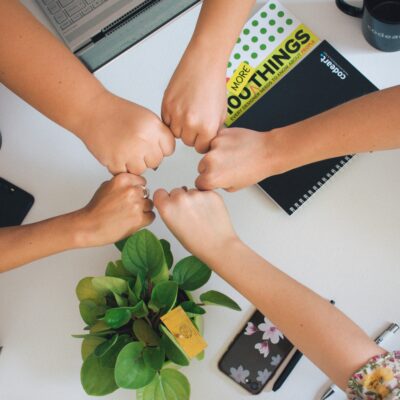 Team work, fists together